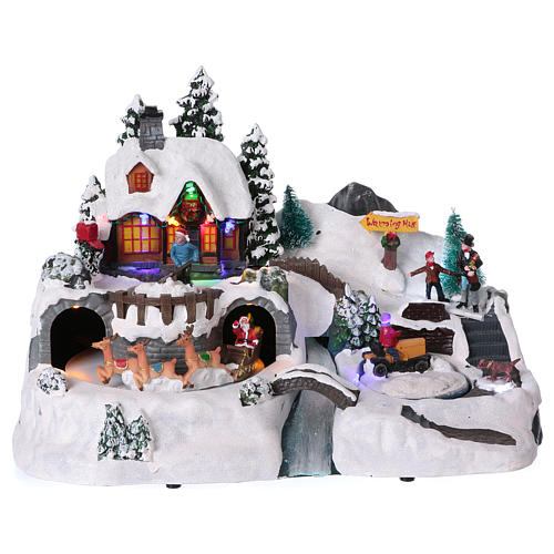 Christmas village with moving characters and Santa Claus 25x35x25 cm 1