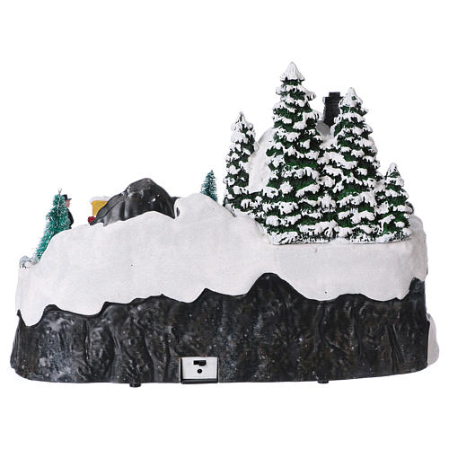 Christmas village with moving characters and Santa Claus 25x35x25 cm 5