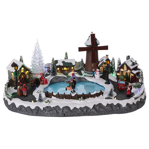 Christmas village with LED lights, moving ice-skaters, tree and mill 20x45x30 cm 1