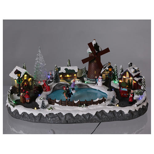 Rustic Christmas Village with Animated Skaters and Mill 20x45x30 cm Battery and Power Operated 2