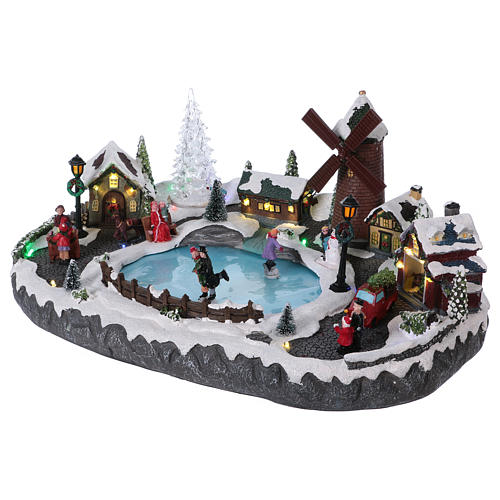 Rustic Christmas Village with Animated Skaters and Mill 20x45x30 cm Battery and Power Operated 3