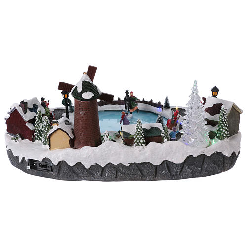Rustic Christmas Village with Animated Skaters and Mill 20x45x30 cm Battery and Power Operated 5