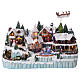 Christmas village with LED lights, ice-skaters and moving train 40x55x30 cm s1