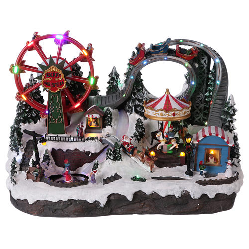 Christmas village with LED lights, moving ferris wheel and ice-skaters 40x55x35 cm 1