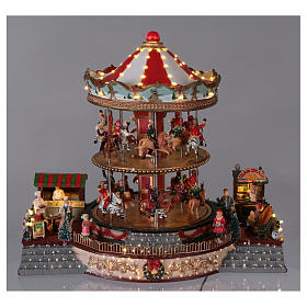 Christmas decoration with lights, moving carousel and music 35x40x35 cm