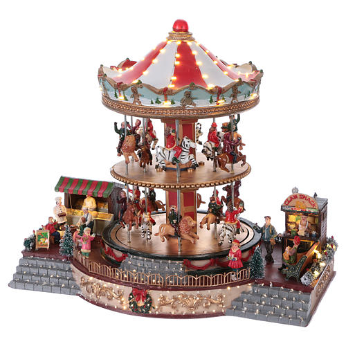 Illuminated Christmas Town with Moving Merry Go Round with music 35x40x35 cm electric powered 3