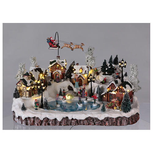 Christmas village with music movement and lights 30x50x35 cm electric 2