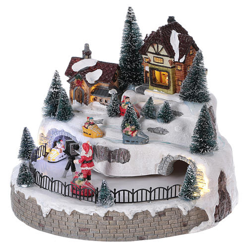 Christmas village with Santa Claus, lights, music and movement 20x25x25 cm 3