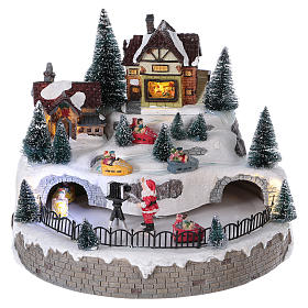 Santa Claus Christmas Village with Moving Lights and Music 20x25x25 cm electric powered