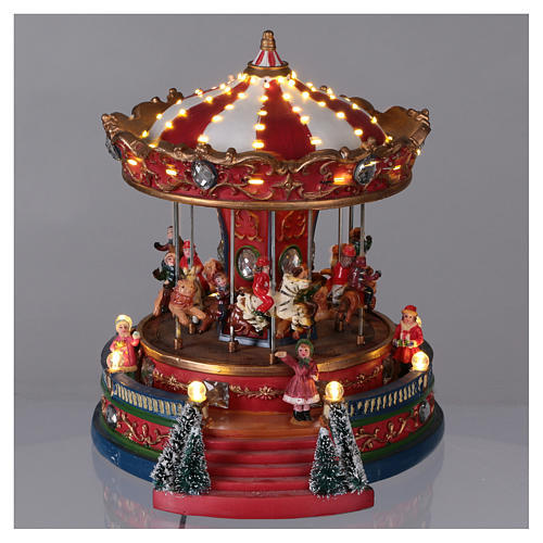Lighted Christmas Village with moving merry-go-round with music 25x20x25 cm electric power 2
