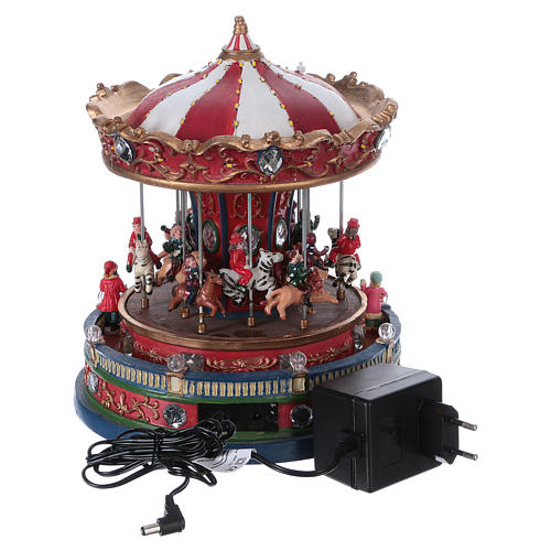 Lighted Christmas Village with moving merry-go-round with music 25x20x25 cm electric power 5