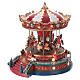Lighted Christmas Village with moving merry-go-round with music 25x20x25 cm electric power s3