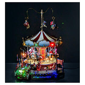 Christmas Carousel Holiday Scene with lights music 25x30x30 electric powered