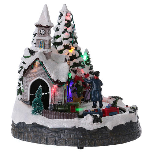 Christmas village with lights music, train and photoghrapher 20x20x15 cm 4