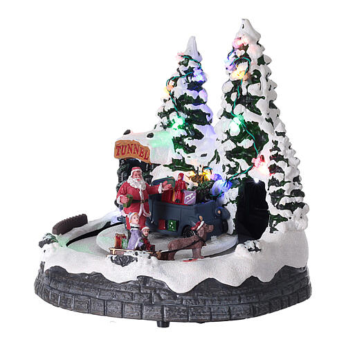 Santa Claus Christmas village children on sled lighted music 20x20x15 cm 3