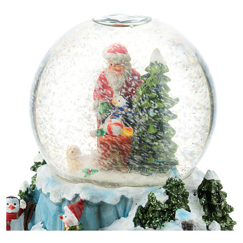 Palla di vetro con Babbo Natale e slitta h. 15 cm 5