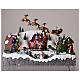 Christmas village with Santa Claus on a moving sleigh 25x40x20 cm s2