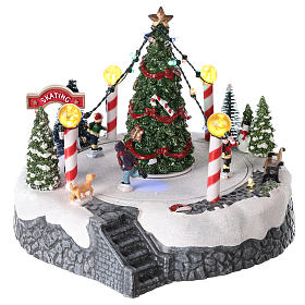 Round village with central tree and revolving skating rink 20x22 cm