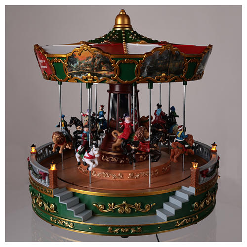 Merry-go-round with animals for Christmas village with lighting movement and music 30x30 cm. 2