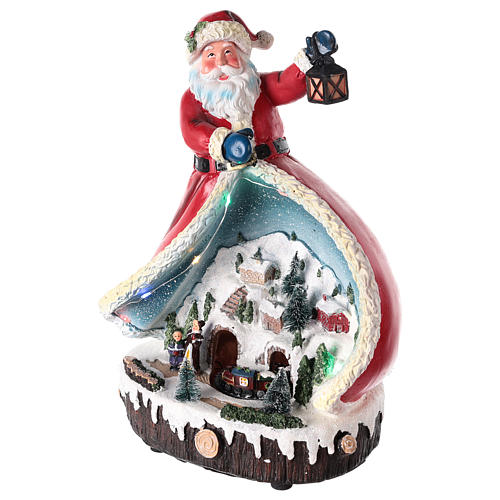 Statue of Santa Claus with village 30x20x15 3