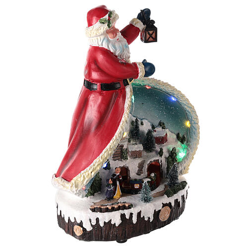 Figurka Świętego Mikołaja z zimowym krajobrazem 30x20x15 cm 4