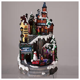 Christmas village with train and toy shop, 35x20 cm s2