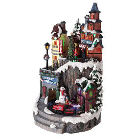 Christmas village with train and toy shop, 35x20 cm s3