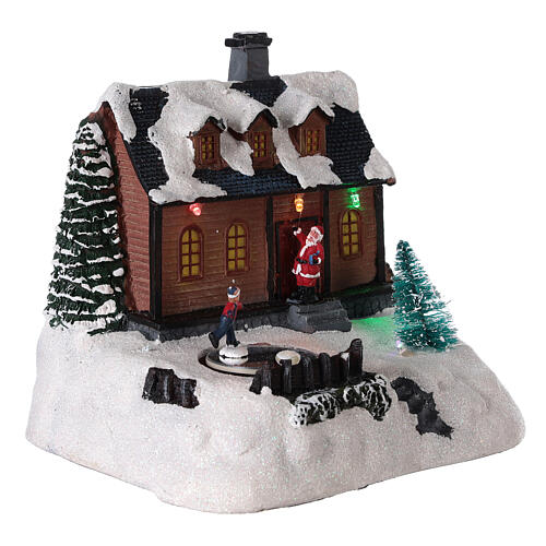Domek do miasteczka bożonarodzeniowego oświetlony z melodyjką 20x20x15 cm 4