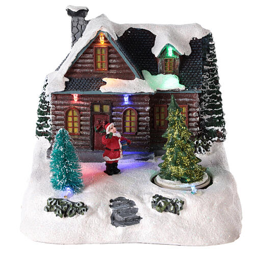 Domek oświetlony ze Świętym Mikołajem do miasteczka bożonarodzeniowego 20x20x15 cm 1