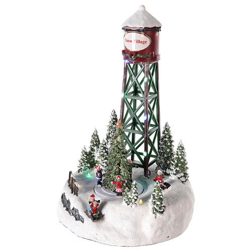 Christmas village water tower with rink and Christmas tree 35x20 3