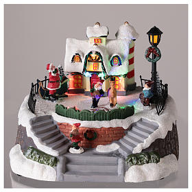 Santa Claus house with elvis for village 15x20 cm s2