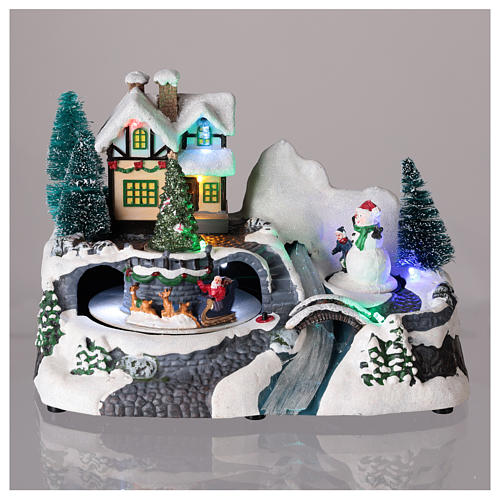 Winter Village with moving Santa Claus on sled 20x25x15 cm 2