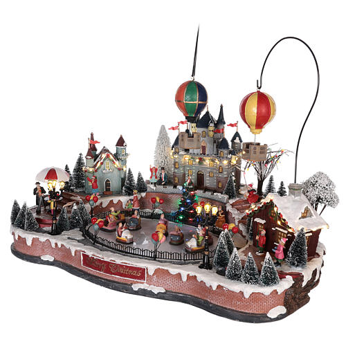 Christmas village with hot air balloons and track for cars 30x65x40 cm 3