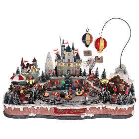Christmas village with hot air balloons and ice rink 30x65x40 cm s1