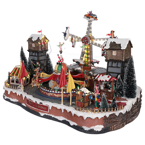 Christmas park with airplanes and merry-go-rounds with reindeer 45x65x45 cm 3