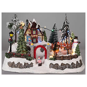 Christmas village with movement and lights 20x30x20 cm
