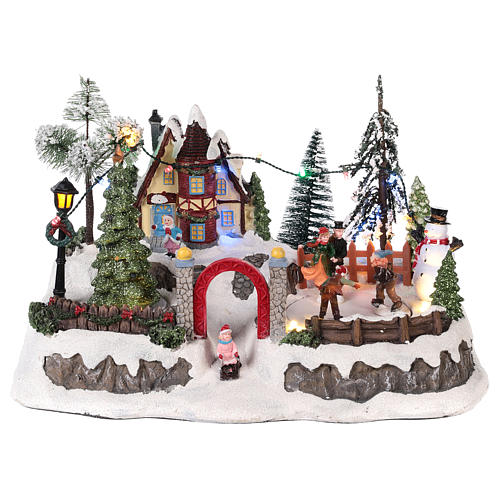Christmas village with movement and lights 20x30x20 cm 1