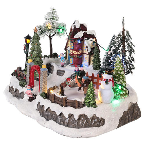 Christmas village with movement and lights 20x30x20 cm 3