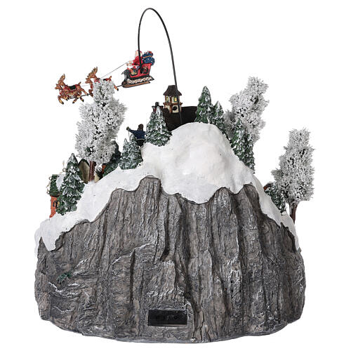 Christmas village with Santa's sleigh ice skaters mouvement lights and music 40x45x35 cm 5