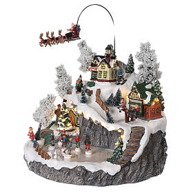 Christmas village reindeer sleigh ice skaters movement lights music s3