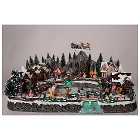 Winter village in resin iced lake movement lights 35x65x40 cm