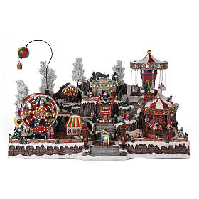 Weihnachtsdorf mit Weihnachtsmarkt und Karussellen beleuchtet, 55x85x55 cm