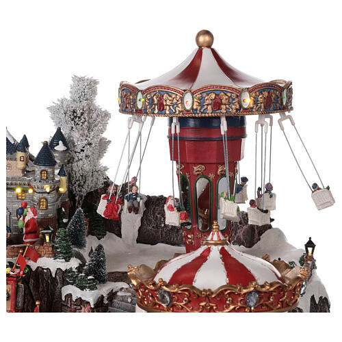 Weihnachtsdorf mit Weihnachtsmarkt und Karussellen beleuchtet, 55x85x55 cm 7