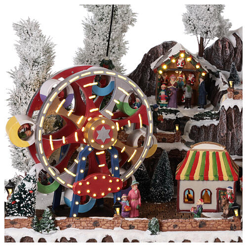 Weihnachtsdorf mit Weihnachtsmarkt und Karussellen beleuchtet, 55x85x55 cm 8