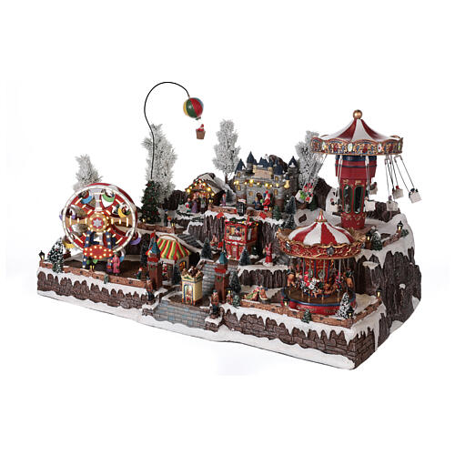 Cenário Natalino em miniatura com castelo e brinquedos em movimento luzes 55x85x55 cm 3