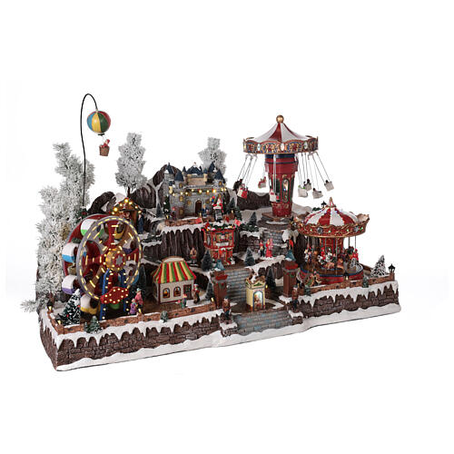 Cenário Natalino em miniatura com castelo e brinquedos em movimento luzes 55x85x55 cm 4