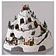 Mountain Christmas village with skiers moving 30x30x25 cm s2