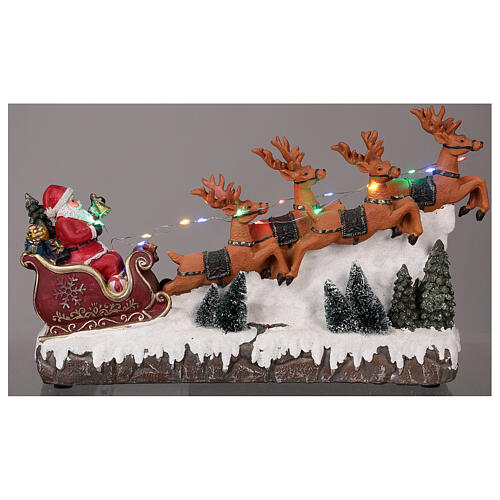 Weihnachtsszene Weihnachtsmann mit Renntieren 25x40x10cm Licht und Musik 2