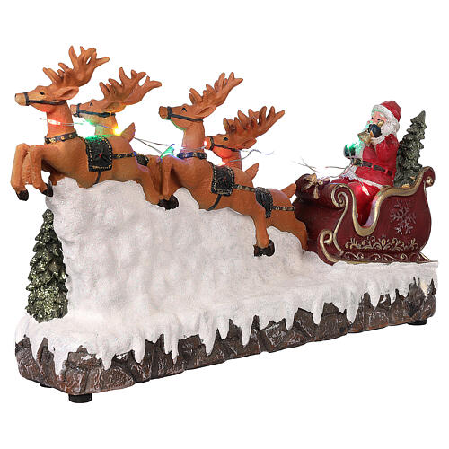 Christmas village Santa's reindeer sleigh with light music 25x40x10 cm 4