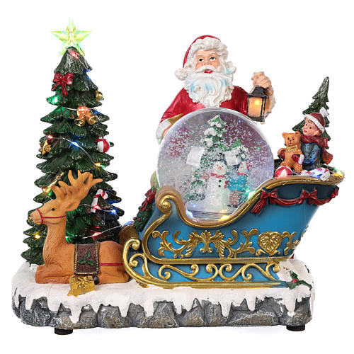Weihnachtsmann Schlitte mit Schneekugel 25x30x20cm Licht und Musik 1
